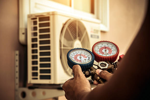 Professional Air Conditioning Service technician working in Northampton, MA
